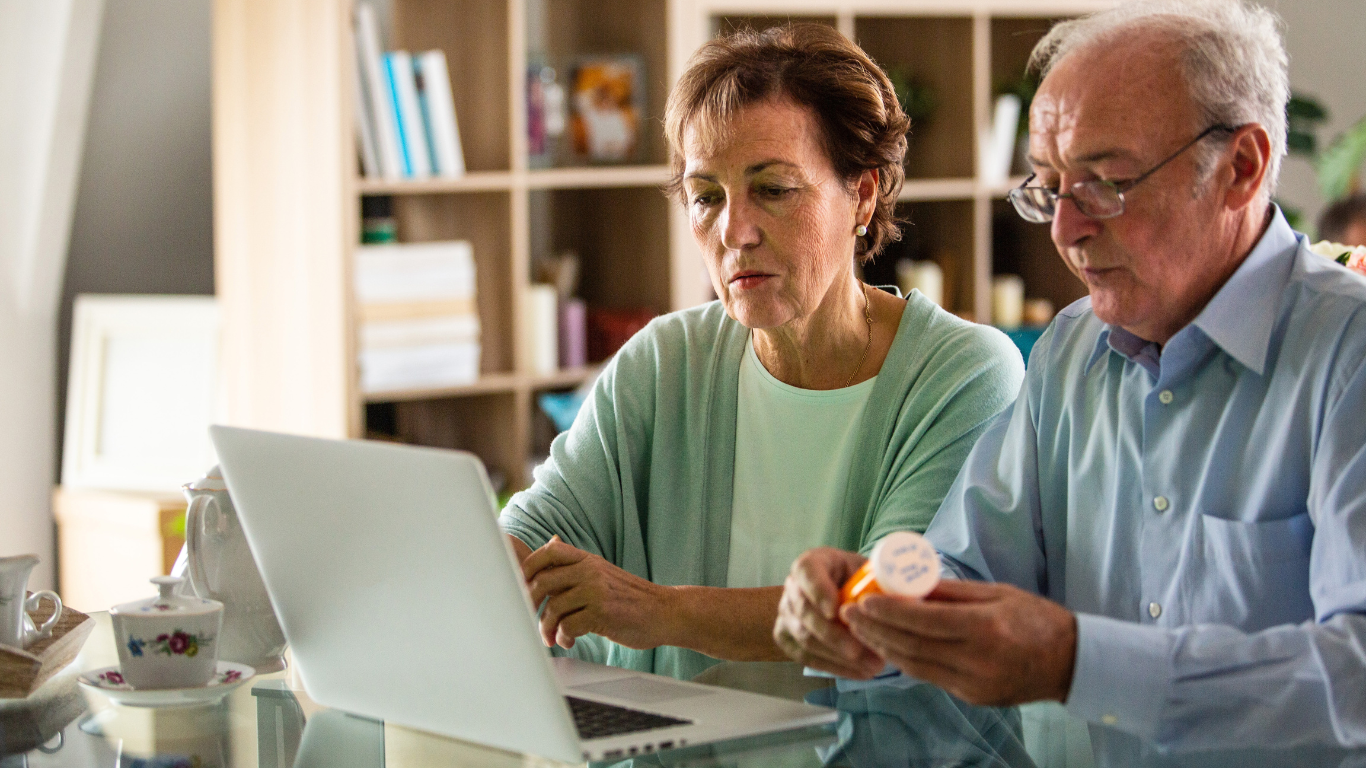 seniors shopping for medications online and looking at the dynamic content at the computer for more product recommendations